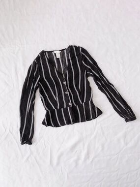 H&M black and white striped peplum long sleeve blouse